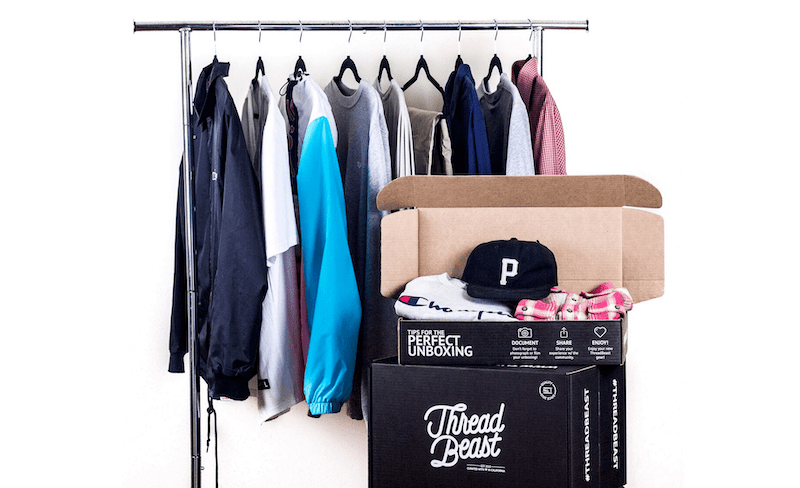 ThreadBeast box and rack of clothes